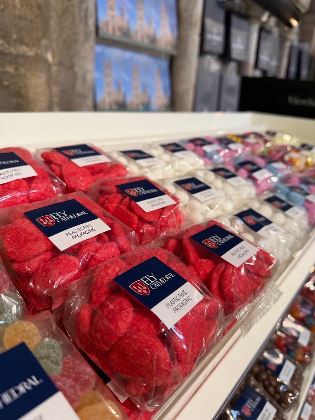 Bespoke labelled sweet bags on shelf at Ely Cathedral